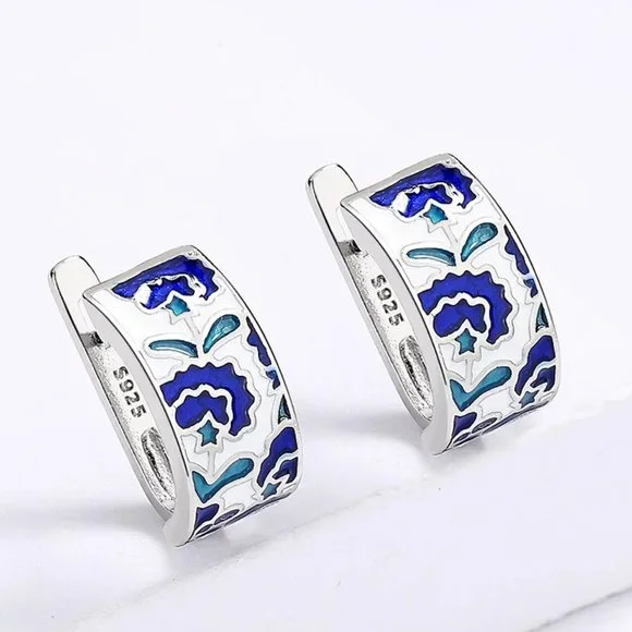 Sterling silver earrings with blue acrylic accents. - Picture 3 of 5